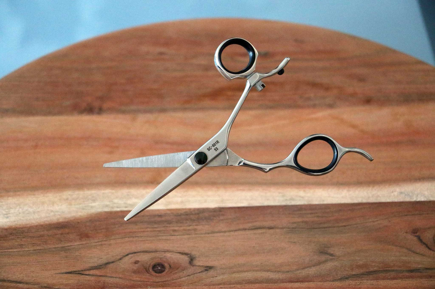 5.3 inch Ridged Offset Swivel Slicer with Fixed Finger Rest