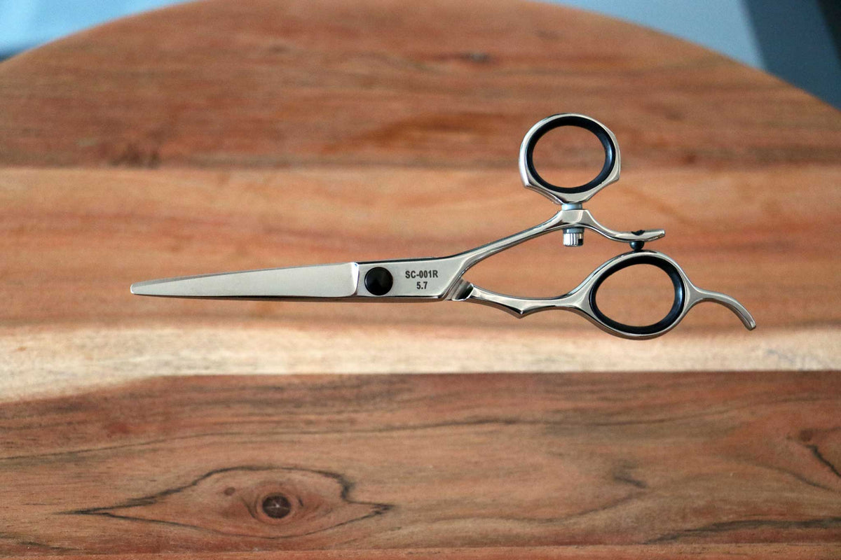 5.7 inch Ridged Offset Swivel Slicer with Fixed Finger Rest